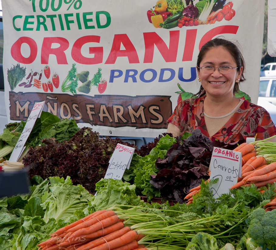 Vendor with her greens